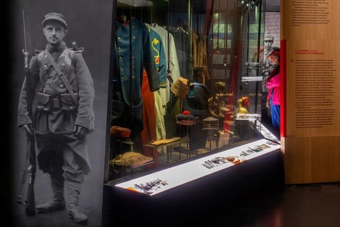 WWI uniforms on display in the In Flanders Fields Museum about World War One at Ypres, Ieper, West
