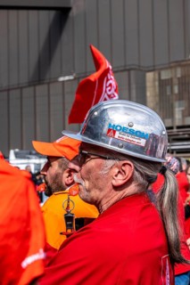 Steelworkers at a demonstration in front of the headquarters of ThyssenKrupp Steel Europe in