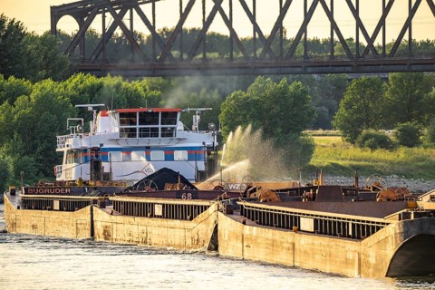 Push boat Veerle with coal cargo, pushed convoy, splashing the cargo with water, cargo ships on the