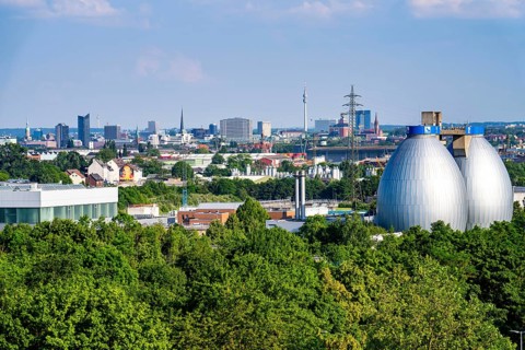 View of Dortmund city centre from the Deusenberg spoil tip, with the digestion towers of the Deusen