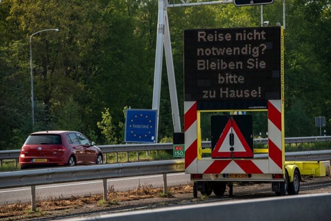 German-Dutch border at Emmerich-Elten, A3 motorway, signal board asks travellers to only make