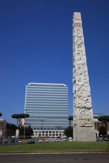Piazza Guglielmo Marconi and Obelisco di Marconi stele and Unogas Energia Spa building, Esposizione