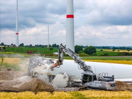 Demolished tower of a 20 year old wind turbine, in the Werl wind farm, 5 old Enercon E-66 turbines