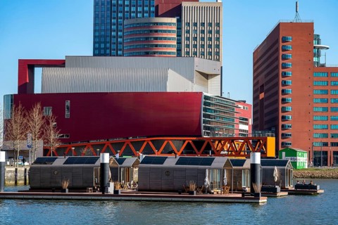 Holiday homes Wikkelboat, at Floating Rotterdam Rijnhaven, floating wooden houses, for rent, at Kop