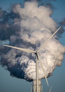 Chimneys, smoke plume of the RWE coal-fired power plant Eemshavencentrale, wind power plant, in the