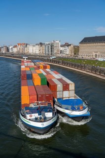 Container freighter, Milliennium II, as a coupled convoy, on the Rhine, on the right the North