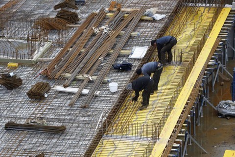 Construction site, reinforced concrete reinforcement bars, for a building ceiling, are installed