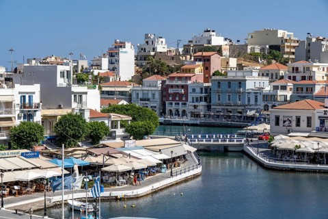 The village of Agios Nikolaos, in the eastern part of Crete, view over Lake Voulismeni, connected