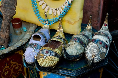 Traditional decorated babouche shoes in the medina, shop, bazaar, flea market, souk, trade,