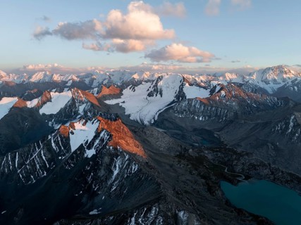 Evening mood, mountain panorama, aerial view, 4000 metre peak with glacier, mountain pass and