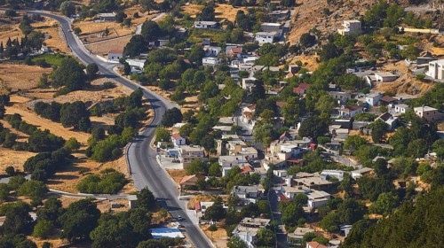 View of the village of Askif, surrounded by mountains and vegetation, Askifou Plateau, Askifou,