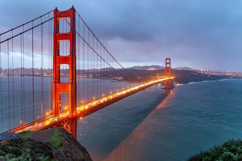 The illuminated Golden Gate Bridge in San Francisco at dusk, California, United States of America,