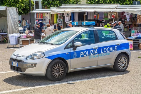 Police car at the market place in Policoro, Matera district, Basilicata, Italy, South Europe,