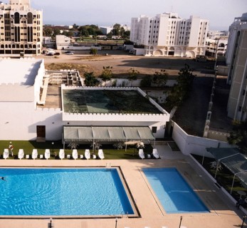 View of the swimming pool from the Holiday Inn Hotel, Muscat, Oman 1998