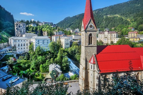 Panorama of the historic town centre with waterfall and parish church, Bad Gastein, Gastein valley,
