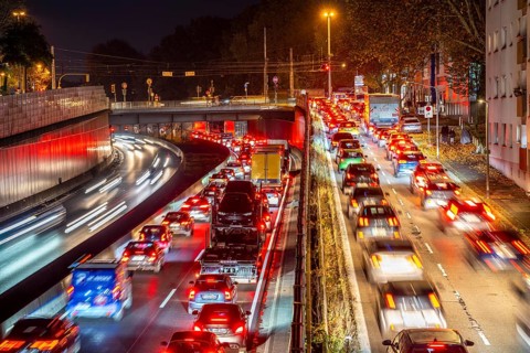 Evening traffic, partly with congestion, slow-moving traffic on the A40 motorway, traffic jam