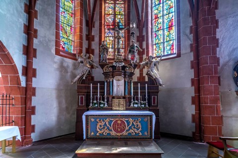 Altar in the interior of the Catholic parish church of St Martin in the Ediger district,