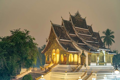 The Buddhist temple Haw Pha Bang of the Royal Palace Luang Prabang at dusk, Laos, Asia