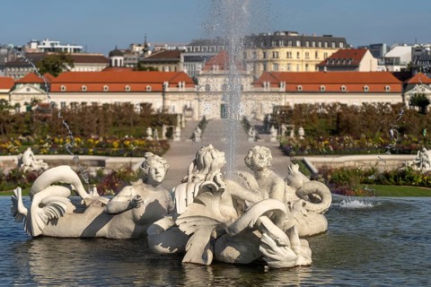 Fountain in the palace gardens and the Lower Belvedere in Vienna, Austria, Europe