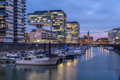 Rheinau harbour and crane houses at dusk, Cologne, North Rhine-Westphalia, Germany, Europe