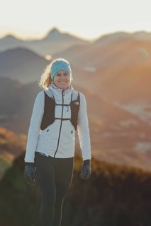 Trail running in autumn on the Jochberg on Lake Walchensee against the wonderful backdrop of the