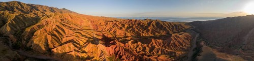 Aerial view, eroded mountain landscape, sandstone cliffs, canyon with red and orange rock