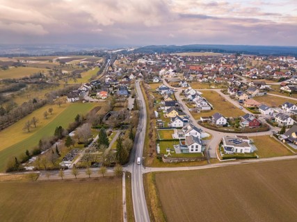 Rural street scene with neighbouring houses and fields in a suburban area, Schopfloch, Freudenstadt