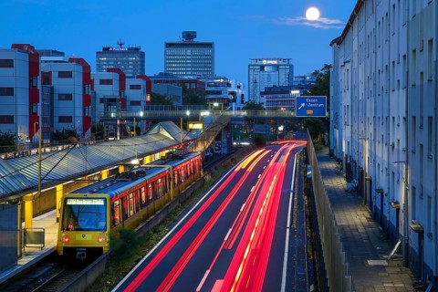 Essen, North Rhine-Westphalia, Germany, A40 motorway in the city centre at dusk. Underground line