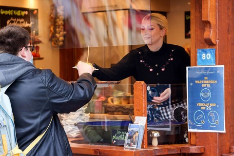 Essen, North Rhine-Westphalia, Germany - Snack stand at the Christmas market in Essen in times of