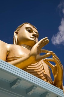 Giant Golden Buddha statue at Dambulla cave temple complex, Sri Lanka, Asia