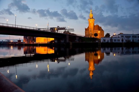 The old harbour office in the neo-renaissance style in the harbour in Dortmund at dusk, North