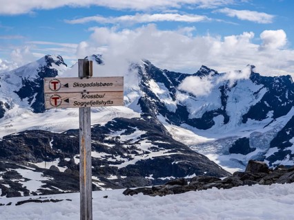 View from mountain Fannaråken towards glacier Styggedalsbreen and peaks Skagastølstindane, hiking