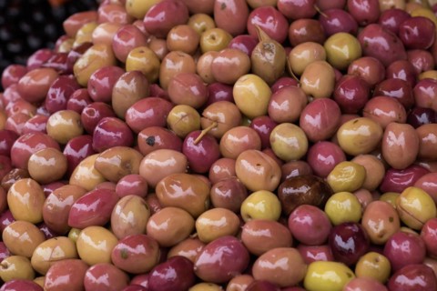 Red pickled olives at a traditional Moroccan market, Medina Essaouira, Morocco, Africa
