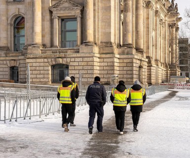 Group of police officers with yellow high-visibility waistcoat, Reichstag, Berlin, Germany, Europe