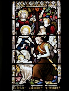 Church of Saint Mary, Gosbeck, Suffolk, England, UK stained glass window birth of Jesus Christ