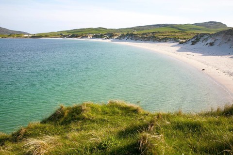 Sandy beach and aquamarine sea at Vatersay Bay, Barra, Outer Hebrides, Scotland, UK