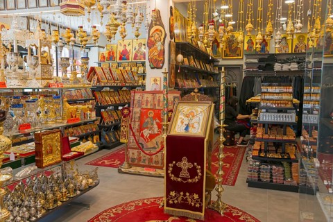 Shop interior full of religious artefacts and Orthodox souvenirs, Ouranoupoli, City of Heaven,