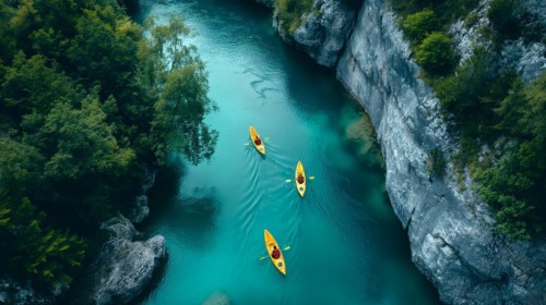 Aerial view of kayakers paddling along a beautiful mountain river. generative AI, AI generated