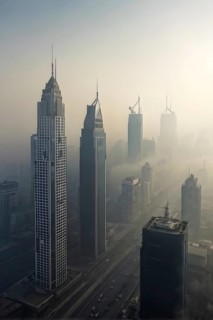 Aerial view of a mega city with smog and pollution, AI generated