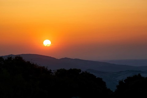 Sunset over mountain range, Sierras Subbeticas Natural Park, near Zuheros, Cordoba province,