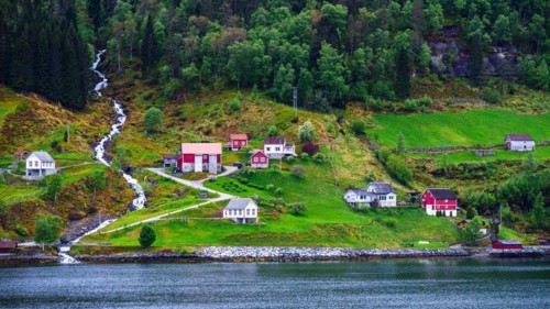 Mountains and Fiord over Norwegian Village in Olden, Innvikfjorden, Norway, Europe