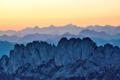 Fribourg Prealps with Gastlosen mountain range at dawn, Bernese Alps behind, cantons of Fribourg