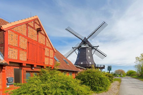 Windmill museum in old smock mill Jachen Flünk in the village Lemkenhafen on Fehmarn island,