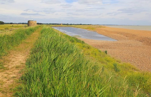 Coastal landforms shingle beach lagoon and bay bar, view north to Shingle Street, Bawdsey, Suffolk,