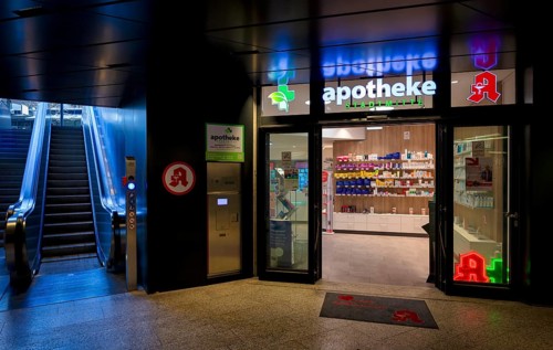 Night shot, pharmacy city centre, logo, subway, escalator, neon light, illuminated, Stuttgart,