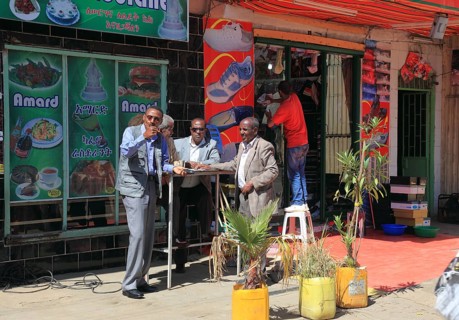 Addis Ababa, in the city centre, locals in front of a snack bar, Ethiopia, Africa