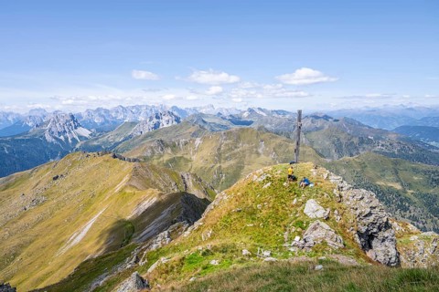 Summit of the Hochspitz or Monte Vacomun, view of the mountain ridge of the Carnic Main Ridge,