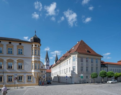 Historic buildings at Leonrodplatz, left Ulmer Hof, right Bischofspalais behind towers of the