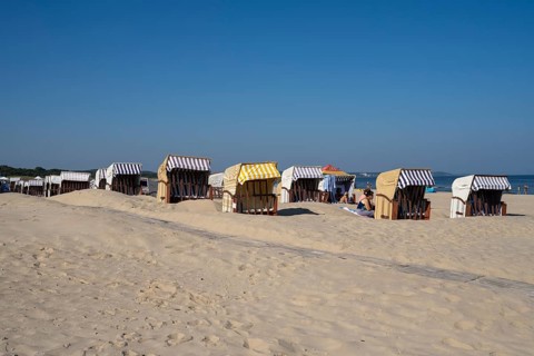 Beach chairs and tourists on the sandy beach, Swinemünde, Usedom Island, Baltic Sea, Poland, Europe