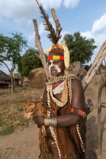 Woman of the Nyangatom ethnic group, also called Bume, in festive dress with body jewellery and
